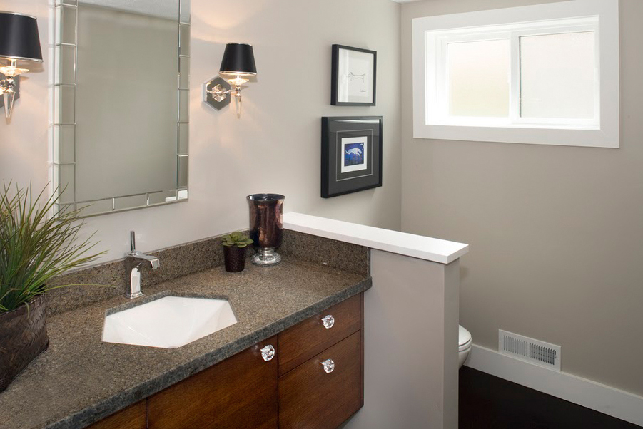 A three-quarter bathroom turns into a powder room